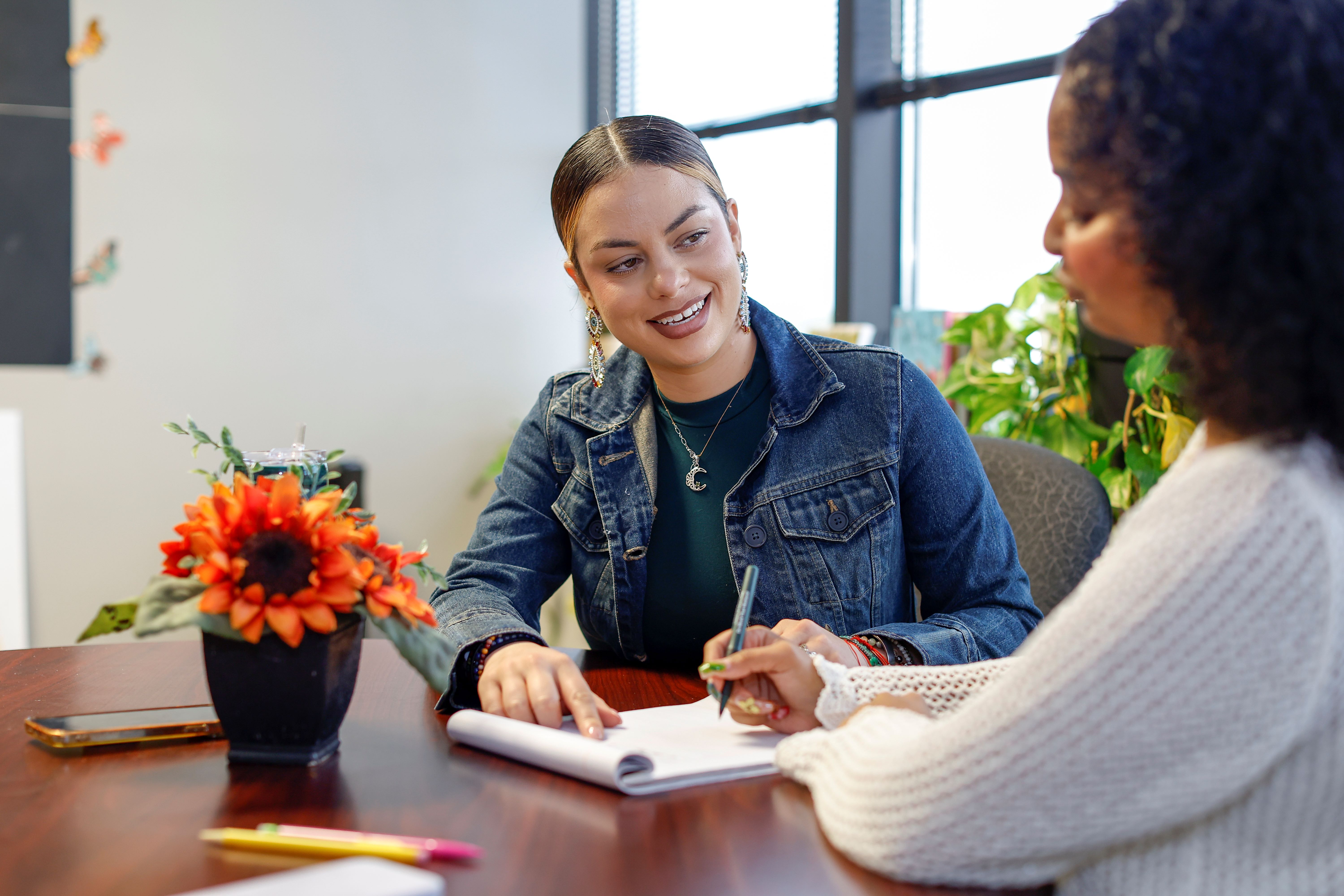 Social workers study together.