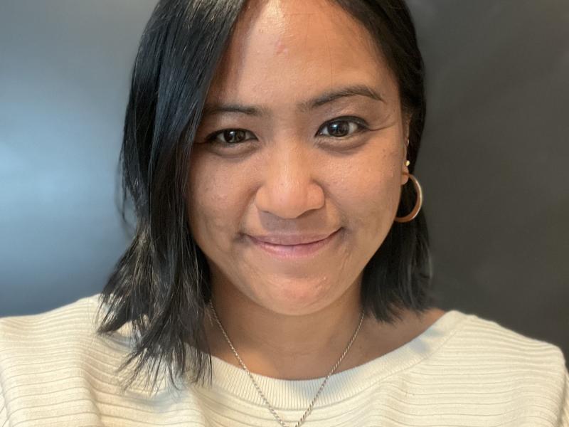 Ashley Tecson smiles.