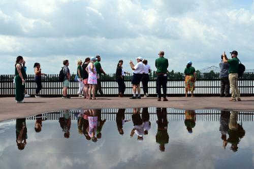 Disaster Resilience Leadership students look at the Mississippi river.