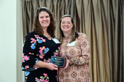 Ann Beck accepts her alumni award.