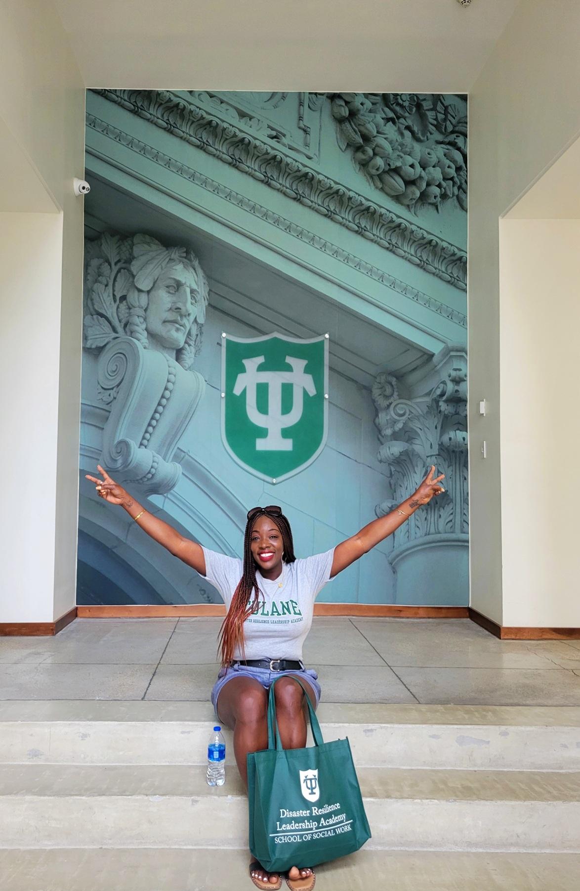 Amy Gyau-Moyer sits in the Tulane School of Social Work building.