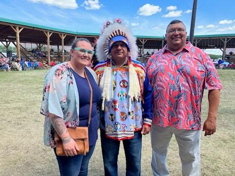 Dr. Jennifer Roberston, Chief Gregory Desjarlais, and Marcel Desjarlais smile