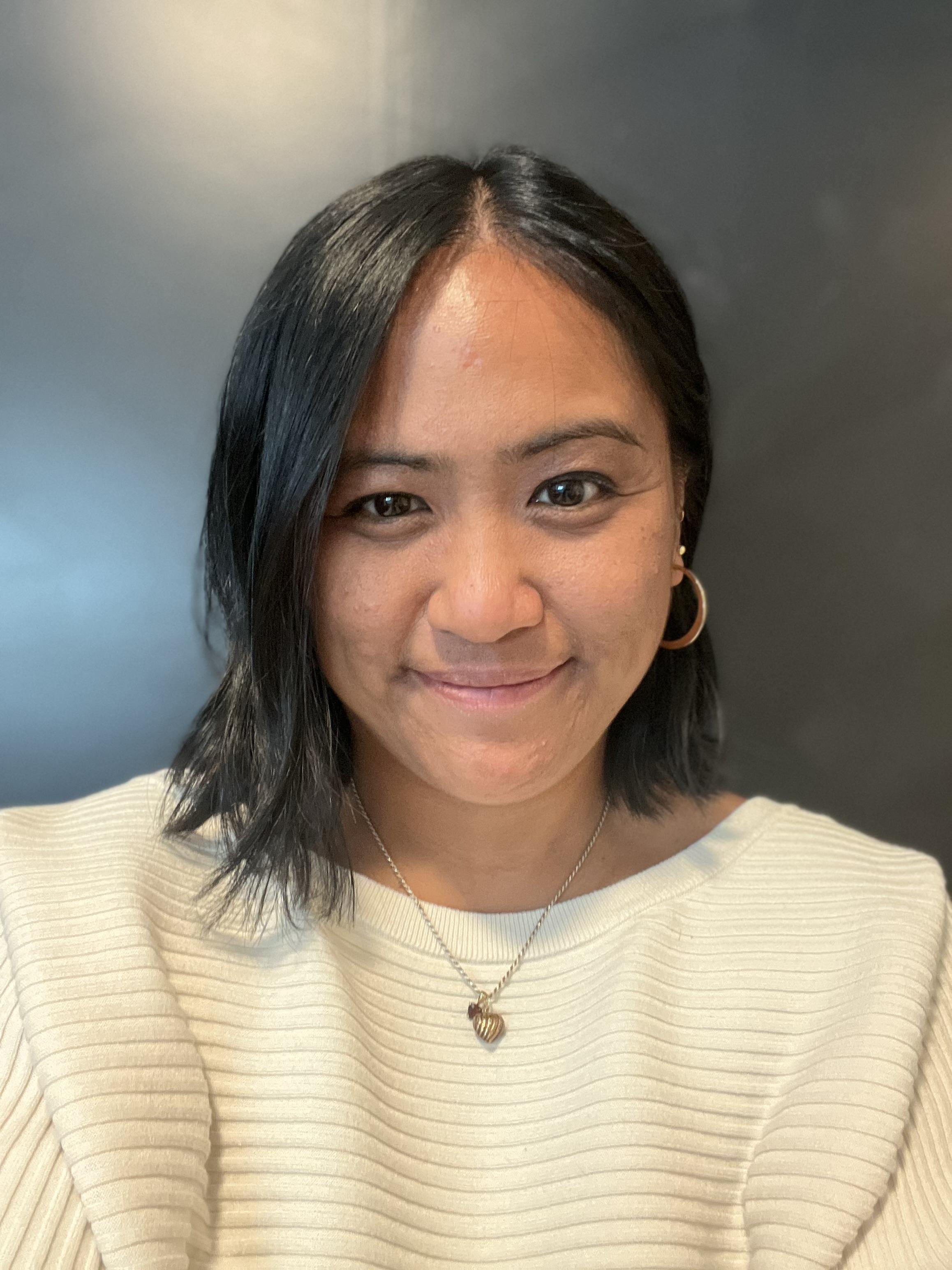 Ashley Tecson smiles.