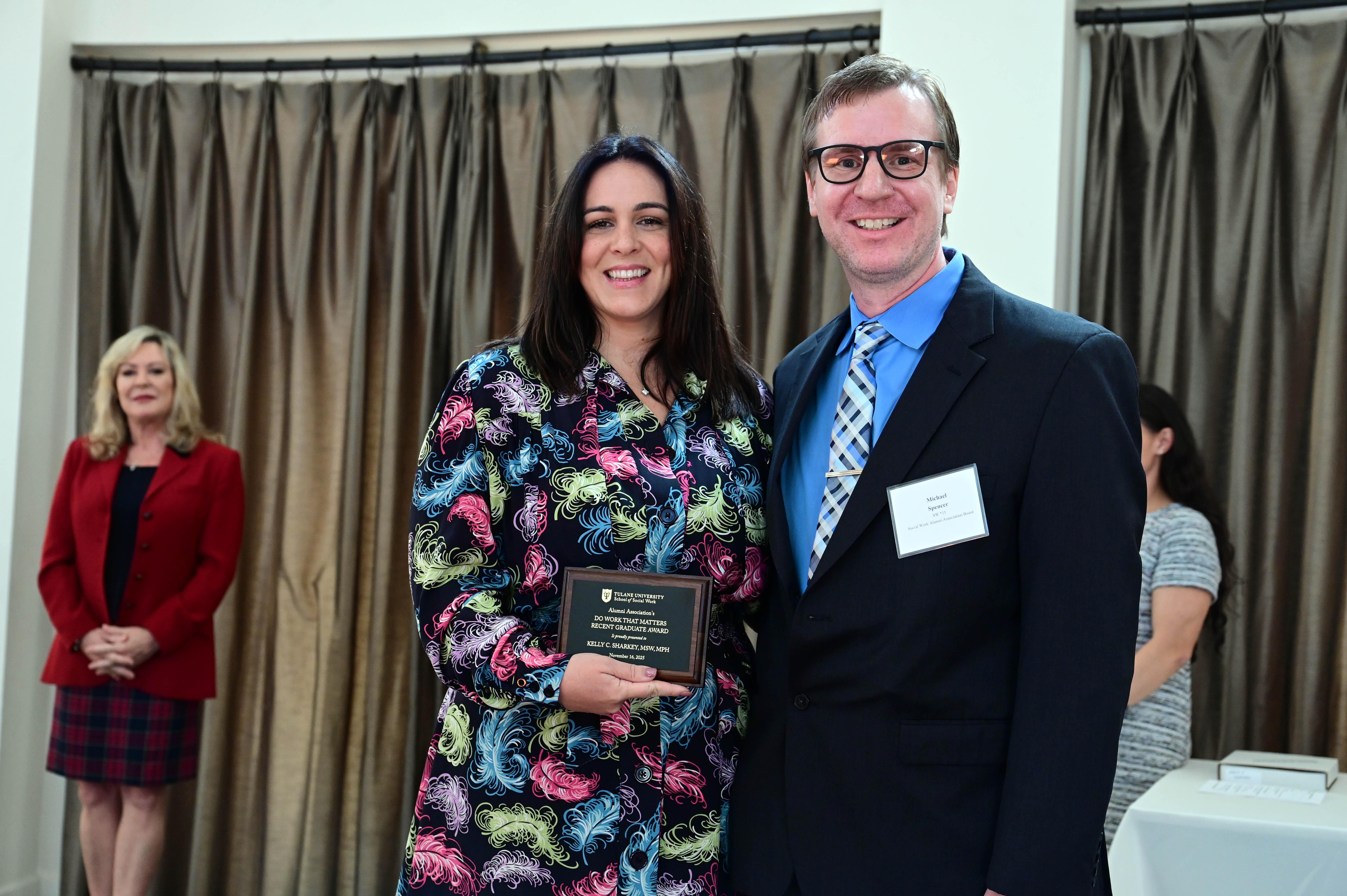 Tulane School of Social Work alumna, Kelly C. Sharkey, accepts her alumni award.