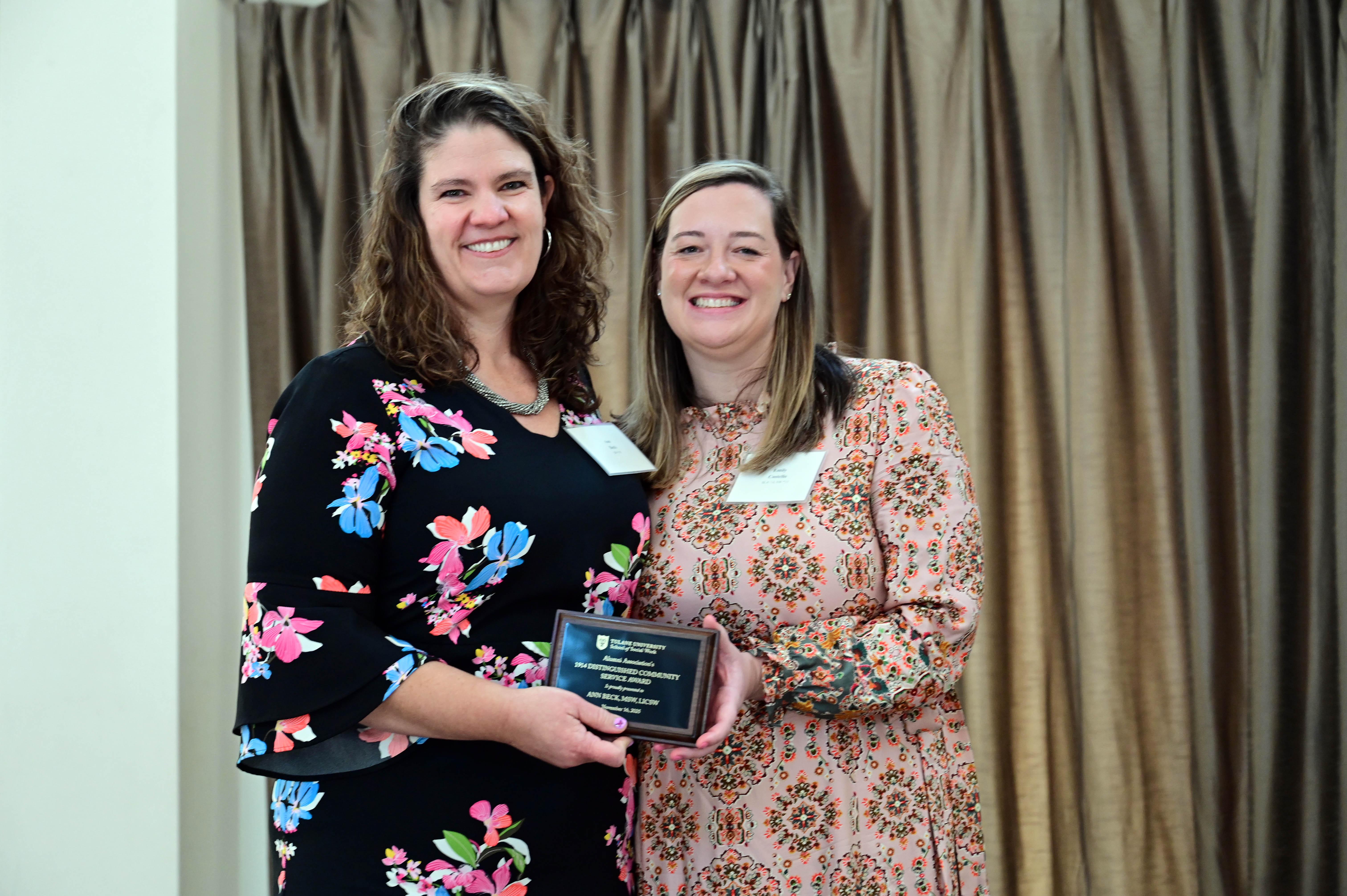 Tulane School of Social Work alumna, Ann Beck, accepts her alumni award.